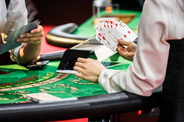 Live baccarat dealer at mauslot login studio with multi-camera setup and professional cards